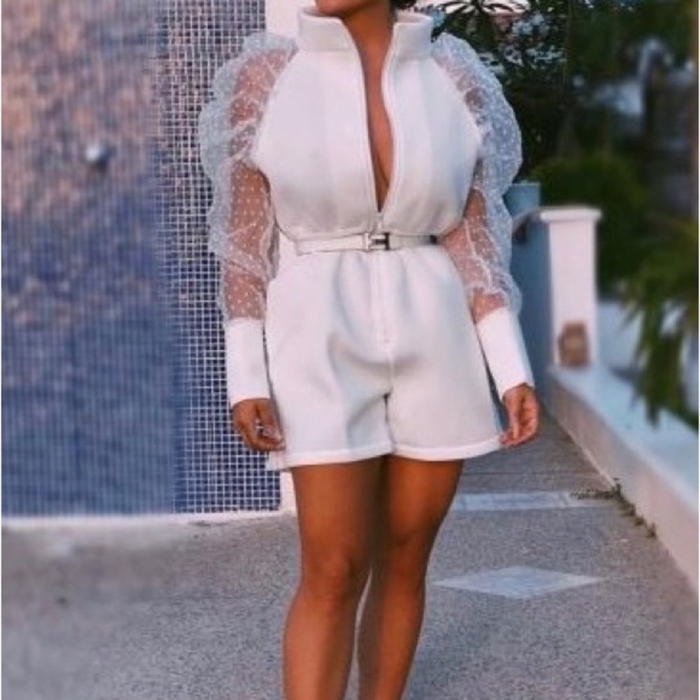 White jumpsuit in size small,med,& large(belt not includes)